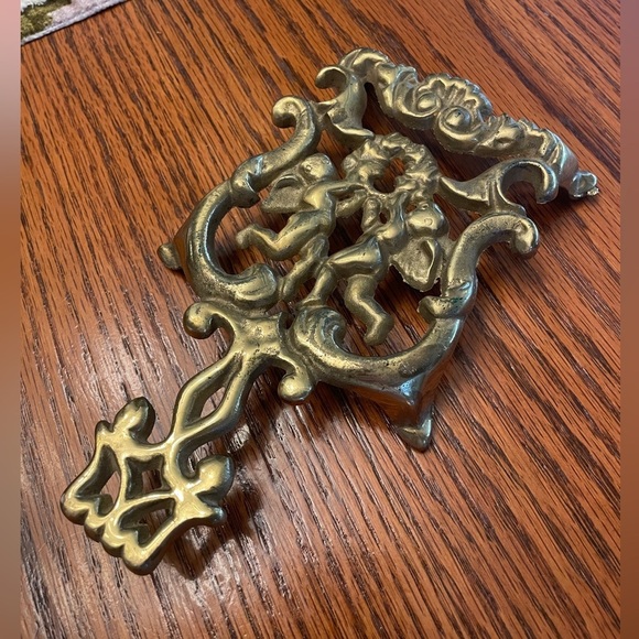 Vintage Gold Cherubs Cupids Scrolls Footed Trivet Cast Iron 8" L X 4.5" W - Picture 3 of 9